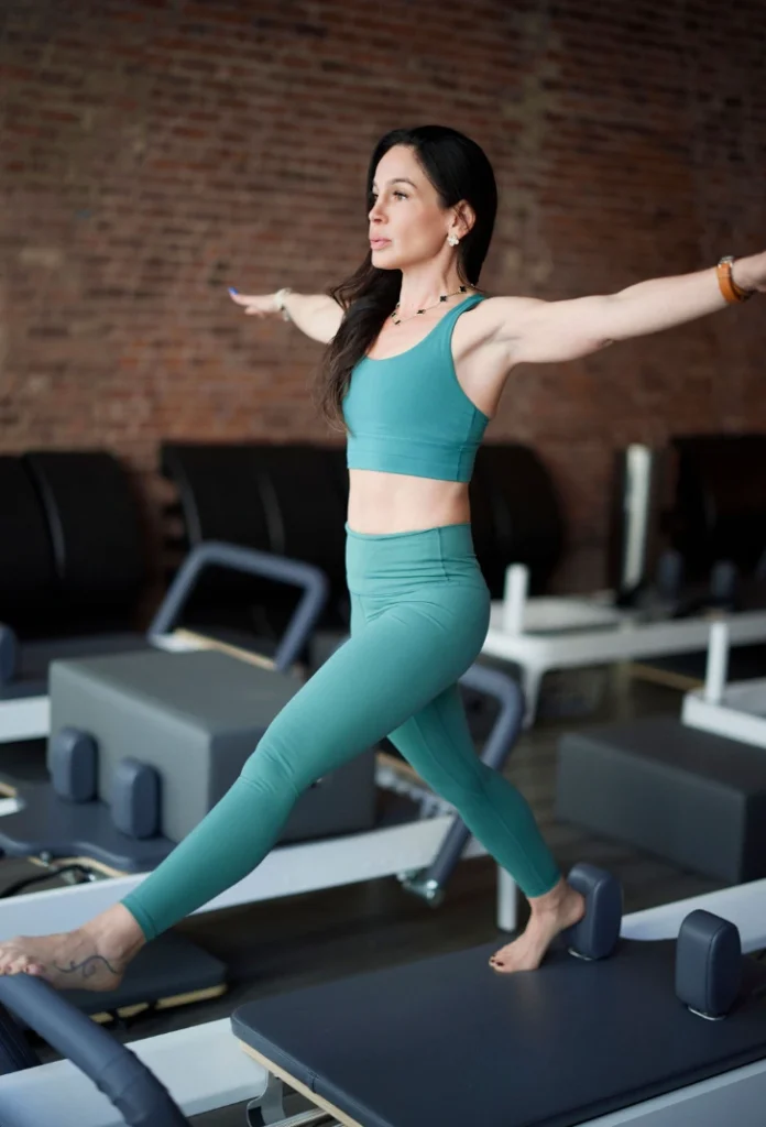 pilates clothes for women — matching set with leggings and sports bra in Park Slope studio