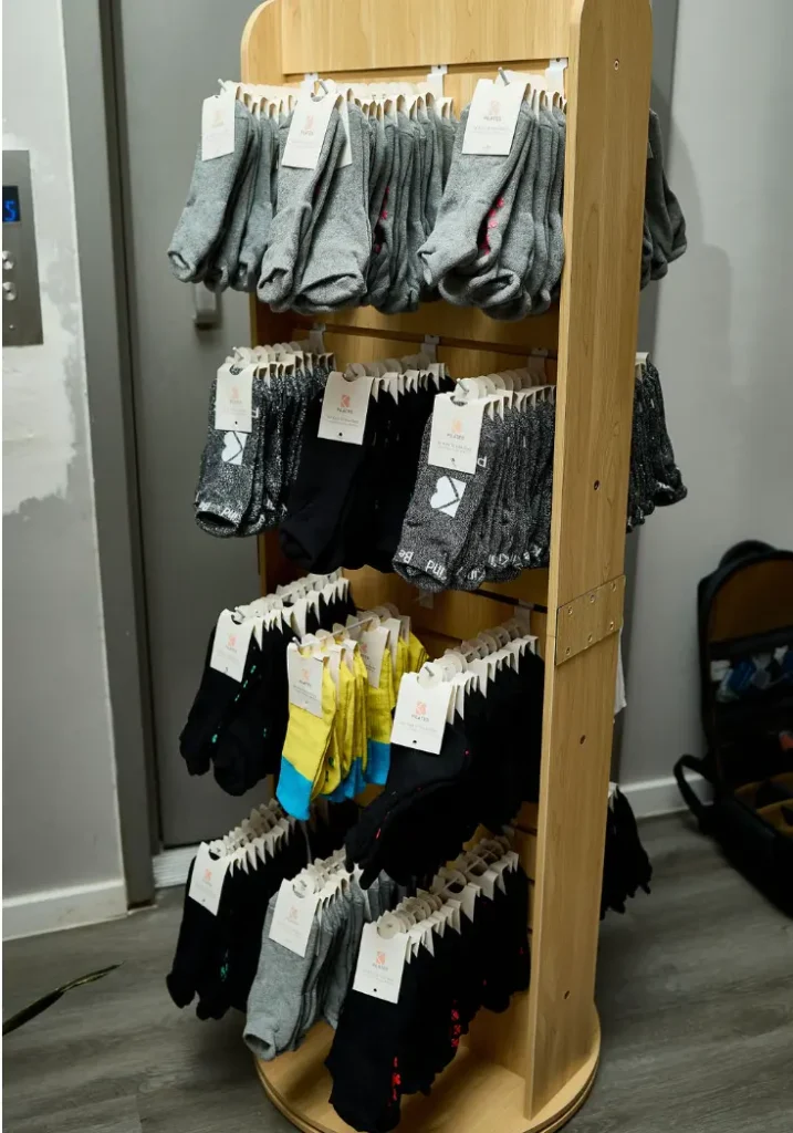 Crew-length Pilates grip socks providing warmth and traction during NYC winter