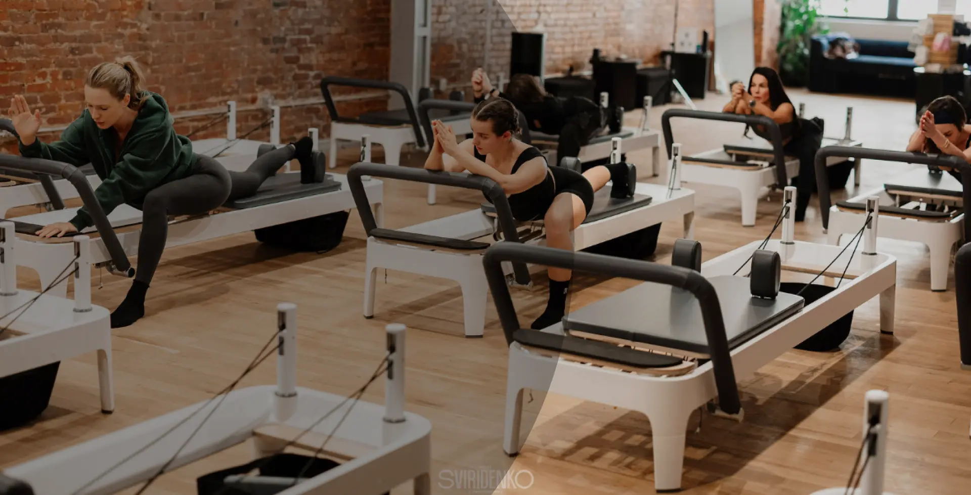 Dynamic Pilates reformer class in the spacious BK Pilates Chelsea studio with exposed brick