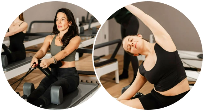 A woman in a Pilates class stretching her back on a reformer